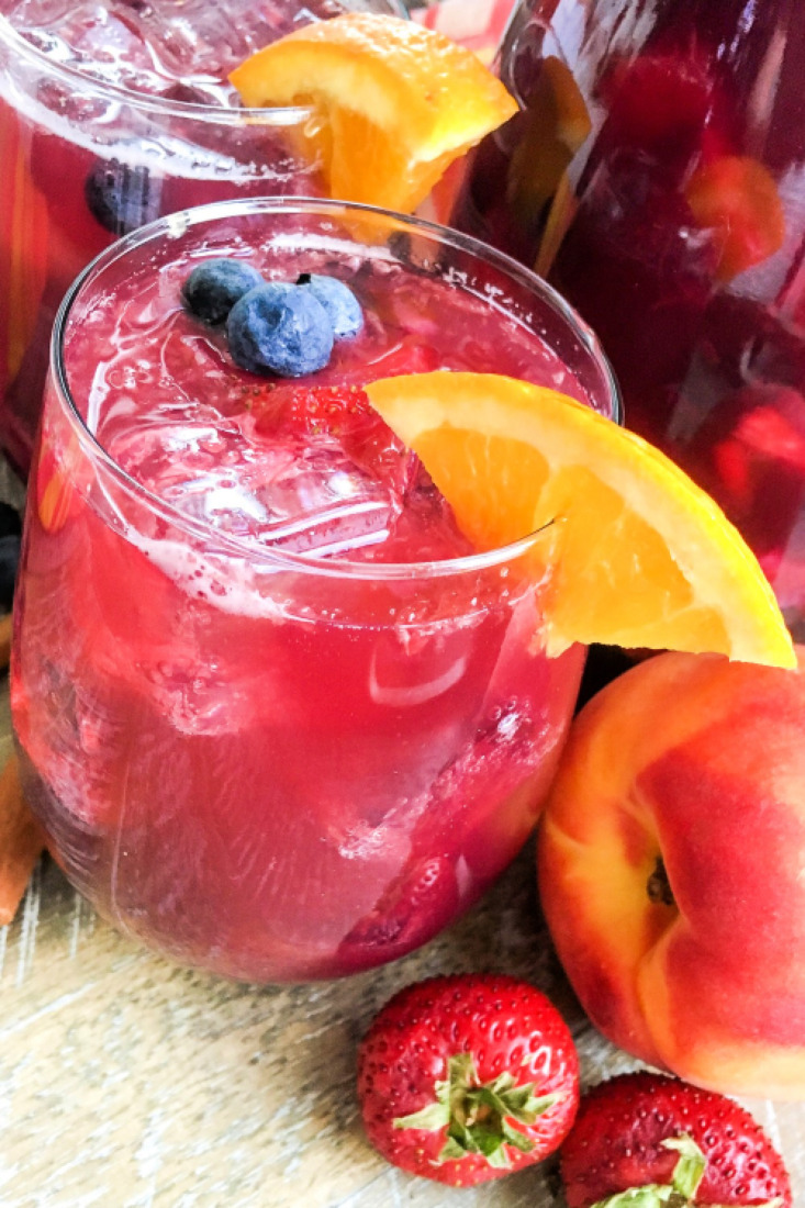Berry Peach Sangria is a refreshing summer drink features rich combination of fresh fruits, juice and wine. A splash of sparkling water right before serving helps balance the sweetness. For an alcohol-free version of this drink, swap out the wine with an equal amount of unsweetened grape juice.