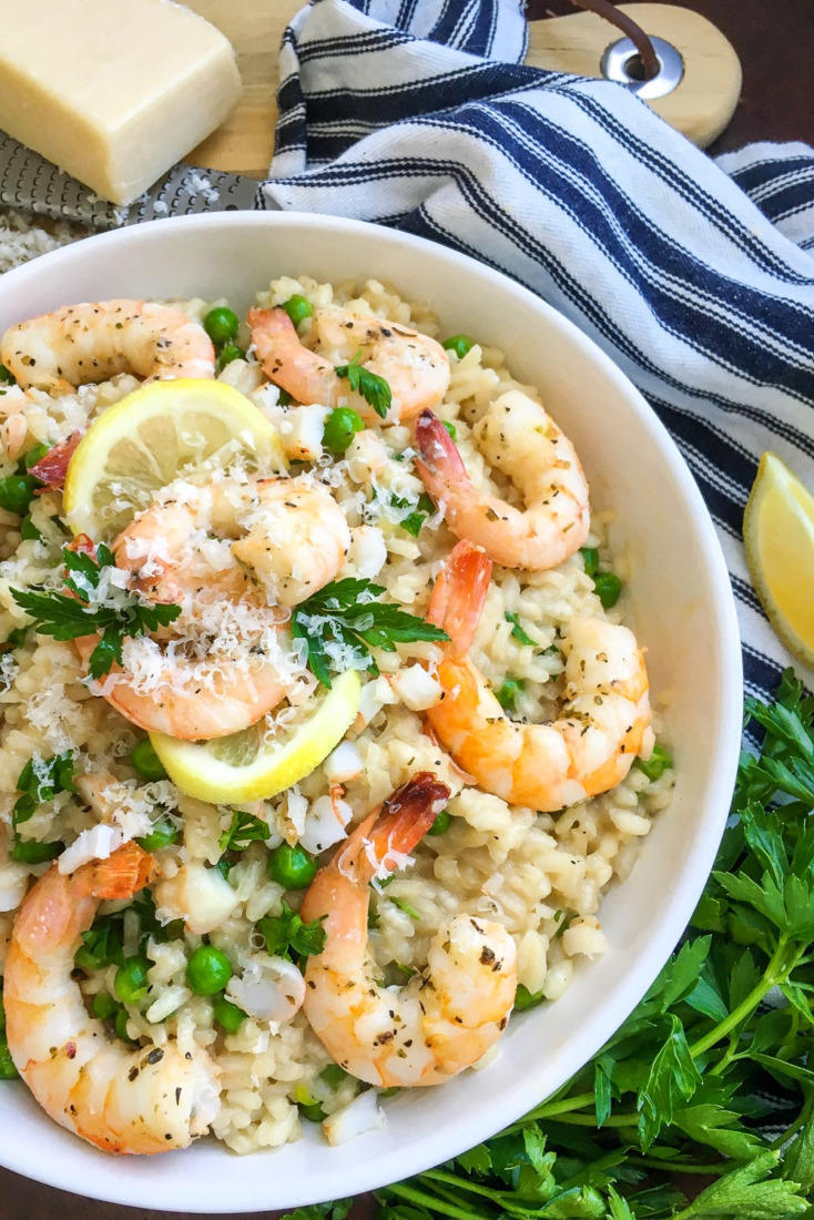 Lemon zest and peas are folded into a creamy risotto and topped off with roasted shrimp in this sumptuous Lemony Pea & Shrimp Risotto.