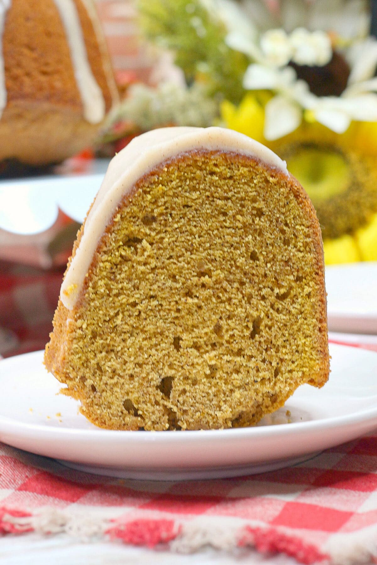 This Spiced chai pumpkin bundt cake features a tender, spiced chai pound cake smothered in an irresistibly buttery chai glaze.