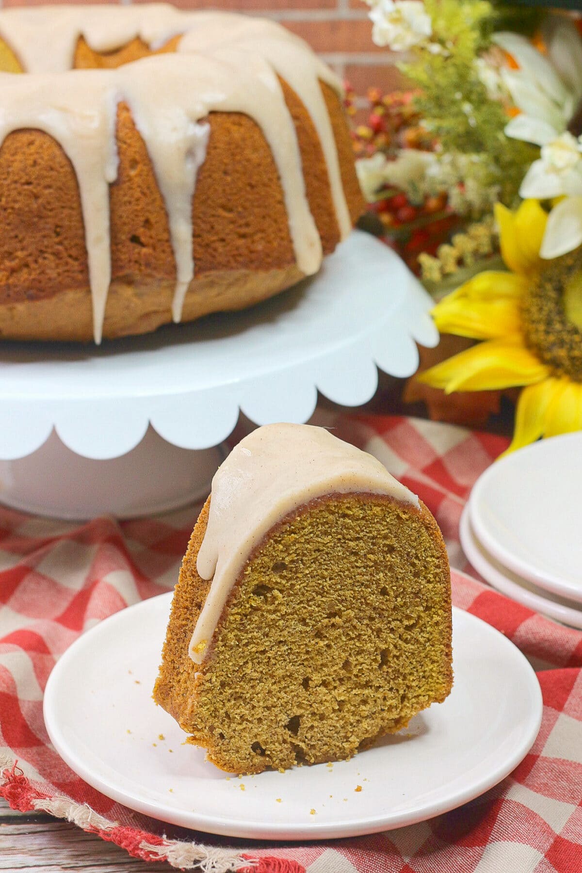 This Spiced chai pumpkin bundt cake features a tender, spiced chai pound cake smothered in an irresistibly buttery chai glaze.