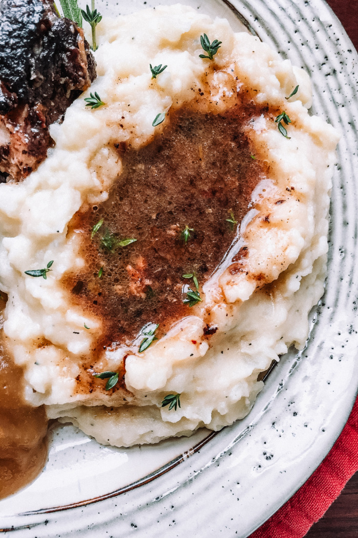 Instant Pot Garlic Mashed Potatoes with Rosemary & Garlic come together for a quick and flavourful side dish.
