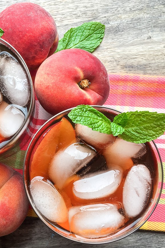 This refreshing, summer-ready ginger-peach iced tea recipe is made with fresh peaches in an instant pot, it's ready in under 30 minutes.