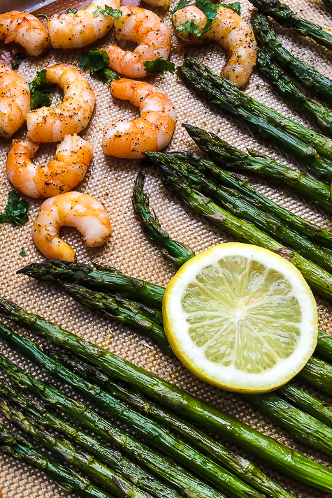 This Lemon-Garlic Shrimp & Asparagus is a one pan meal that is quick, easy, tasty and healthy! A great way to get some veggies in your diet.
