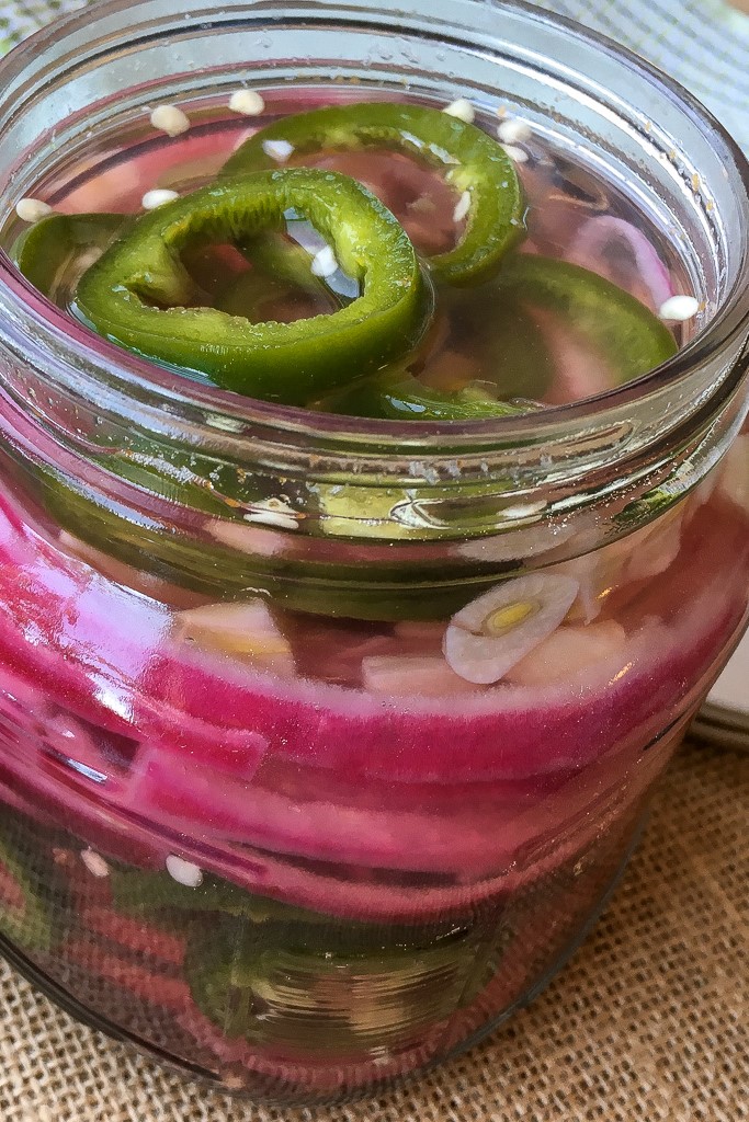 These pickled jalapeno peppers and red onion recipe is a quick and easy recipe for tasty small batch refrigerator pickles!
