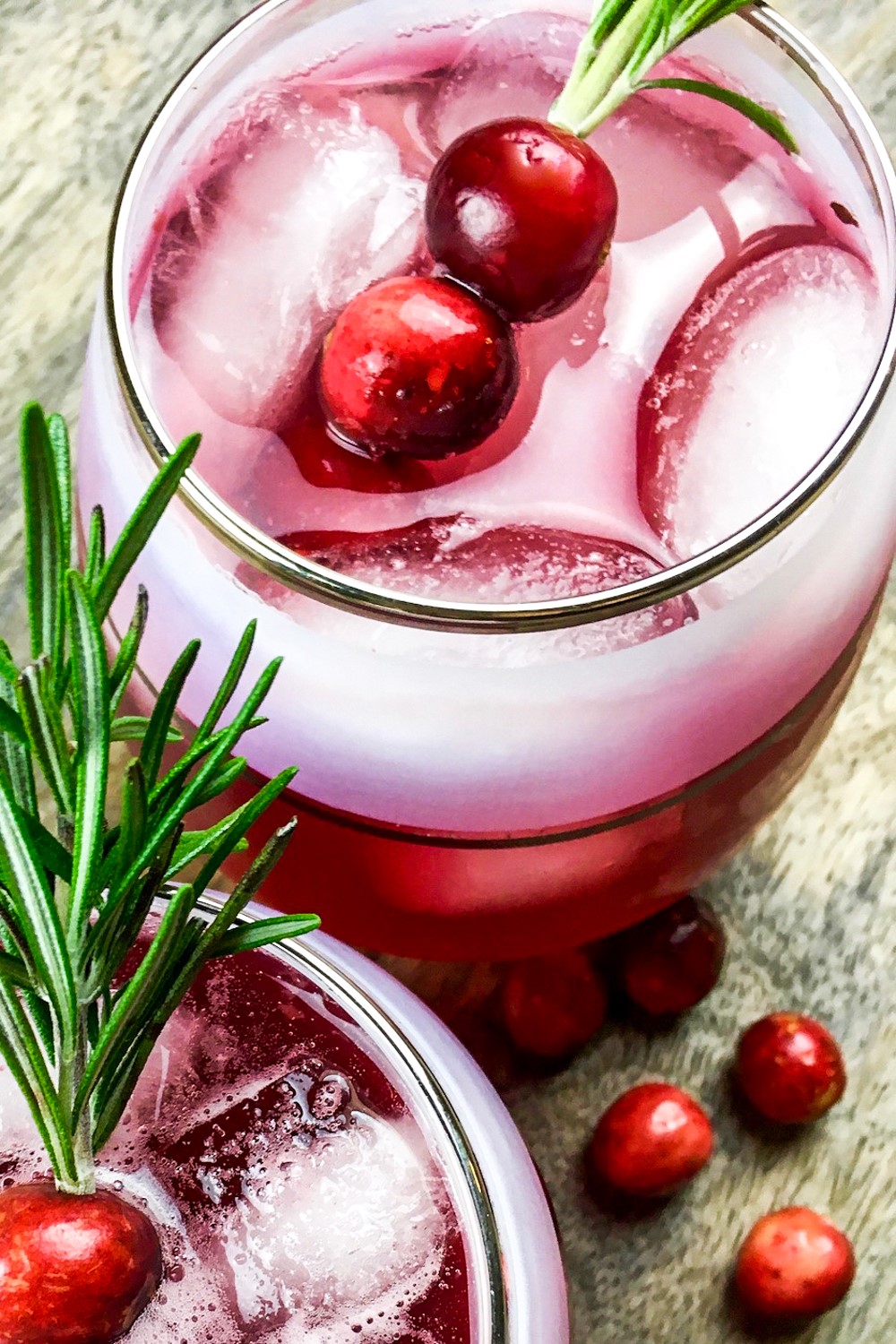 Spiced Cranberry Spritzer is a festive drink with cranberry, orange, and cinnamon. Add vodka for an adults-only treat, or omit for a mocktail.