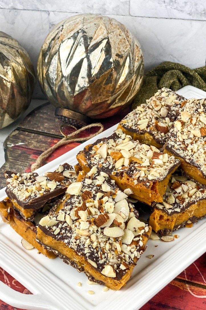 Almond Buttercrunch Candy recipe featuring homemade Honeycomb and loads of chocolate and almonds. It's an addictive holiday treat!