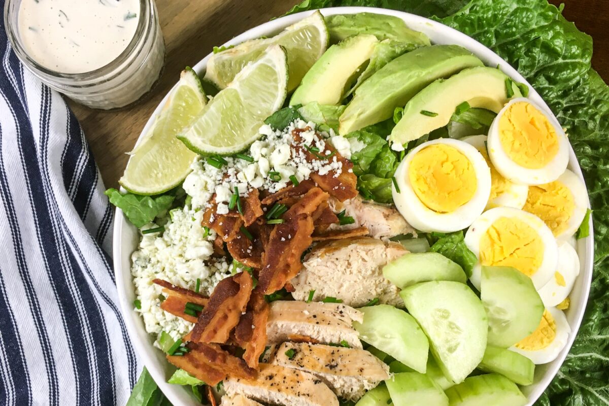 A tasty keto cobb salad with homemade ranch dressing. It's loaded with protein, fat and good-for-you veggies! Plus it's easy to make at home.