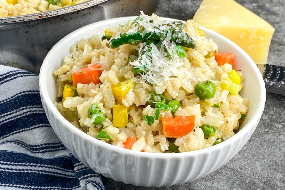 Our risotto primavera recipe is a cheesy risotto dish filled with veggies. It's a perfect side dish or main course for any season!