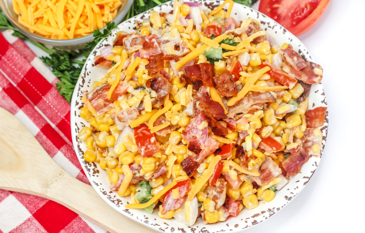 This grilled crack corn salad recipe pairs sweet and salty for an unexpectedly delicious summer side dish that pairs well with grilled meat!
