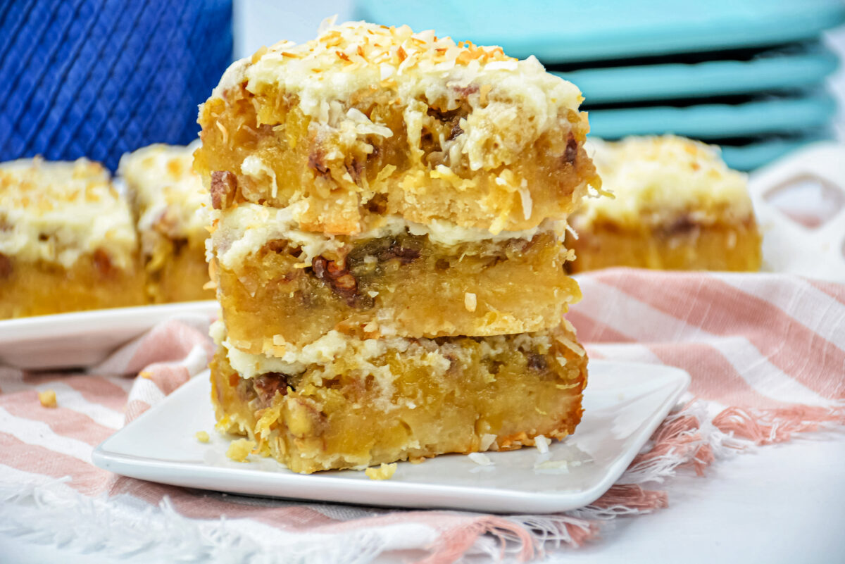 These delicious Hawaiian pineapple bars will transport you right to a tropical paradise with their pineapple, coconut and pecan filling!