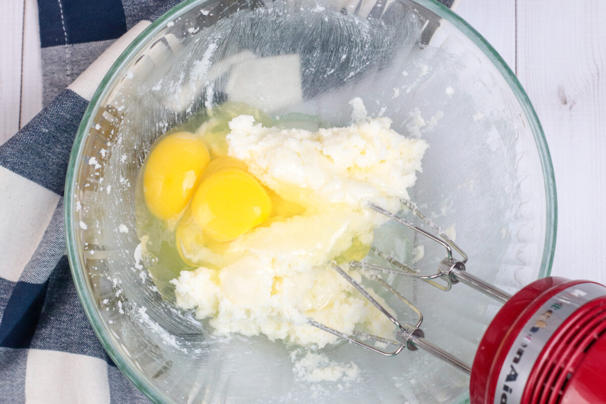 Eggs being beaten into the wet ingredients.