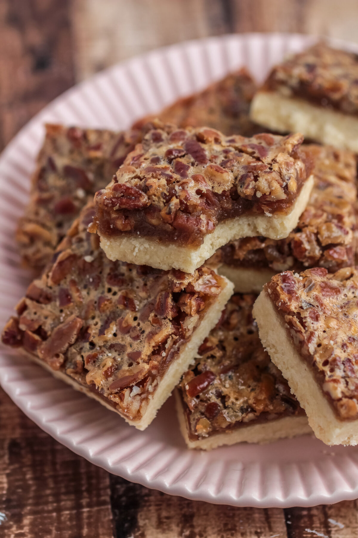 These pecan pie bars are the best dessert for family gatherings! With a gooey filling, and loads of pecans, they're sure to be a hit.