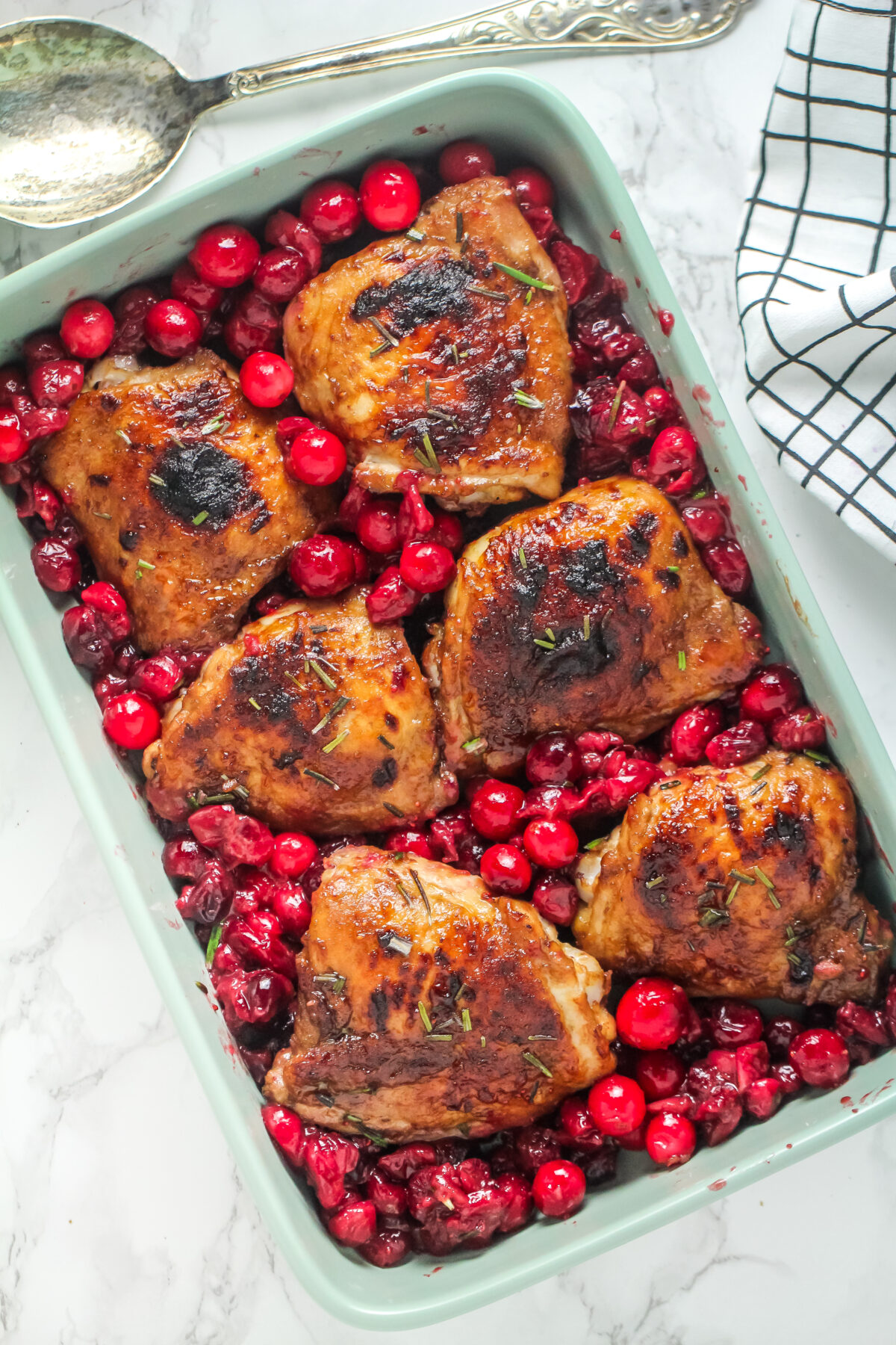 This easy cranberry chicken recipe is a delicious way to feed the family over the holidays or any time you want a good home cooked meal.
