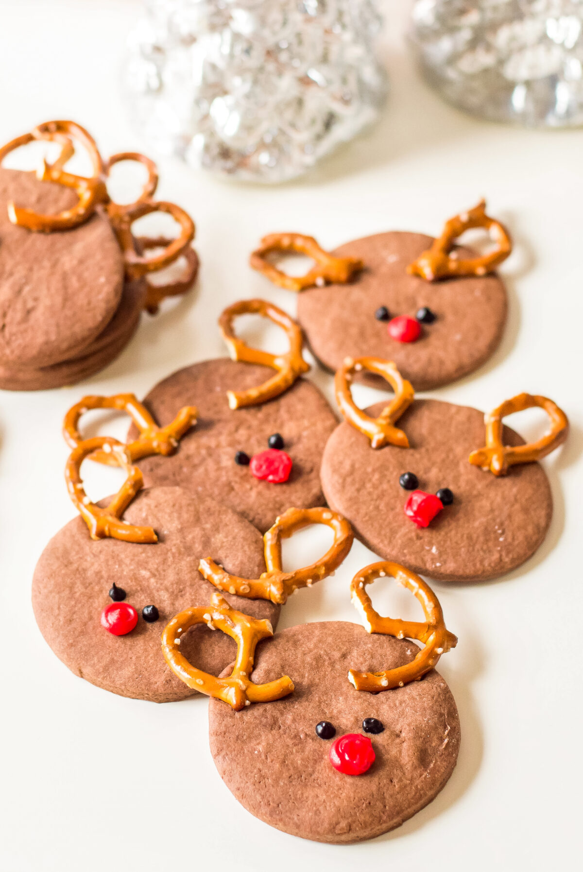 Find out how to make these delicious and festive Rudolph chocolate sugar cookies this Christmas with this easy sugar cookie recipe.