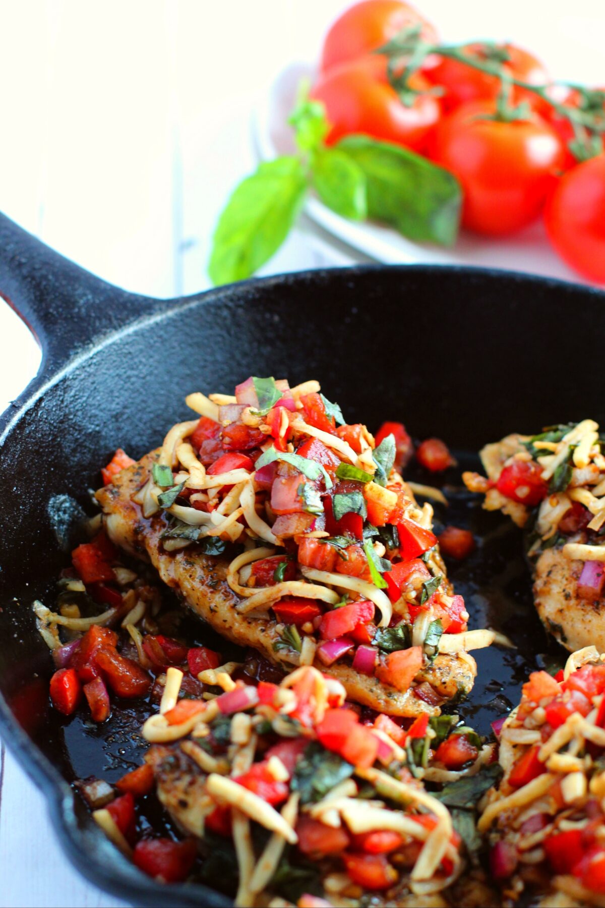 A delicious, easy to make chicken dish that is perfect for a quick weeknight meal. This skillet bruschetta chicken will be a family favorite!
