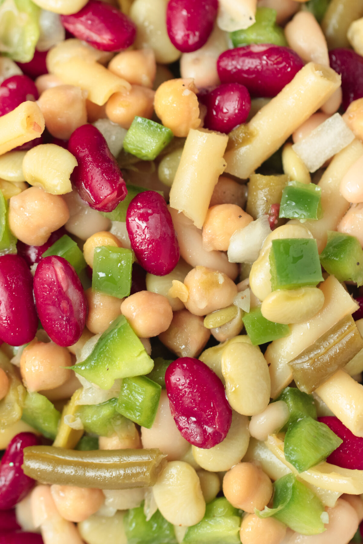 Get the perfect mix of flavor and nutrition with this easy 5 bean salad recipe. Whip up this classic dish in no time for any occasion!