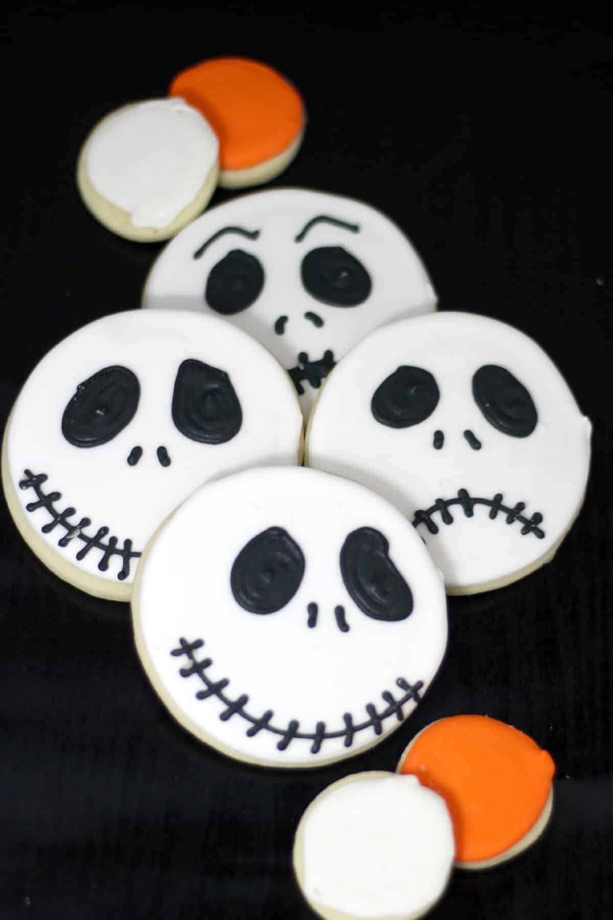 Make Jack Skellington cookies with this easy recipe and royal icing. These fun Nightmare Before Christmas cookies are perfect for Halloween!